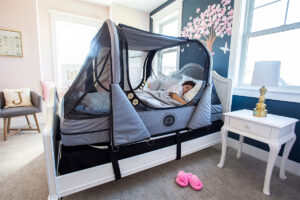 photo of bedroom with inflatable safety sleeper on the bed